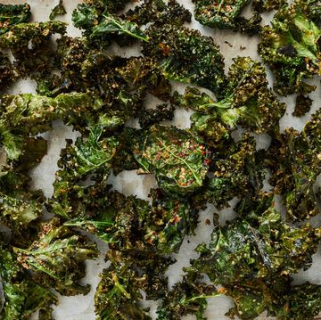 homemade crispy kale chips on a sheetpan