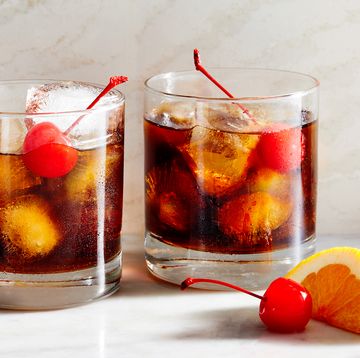 black russian with cherries and an orange slice