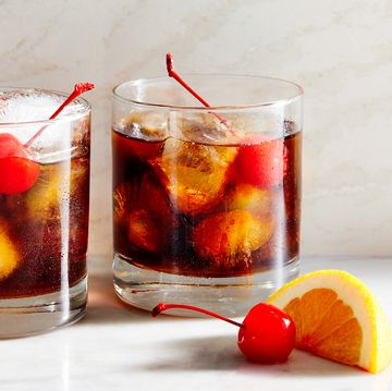 black russian with cherries and an orange slice