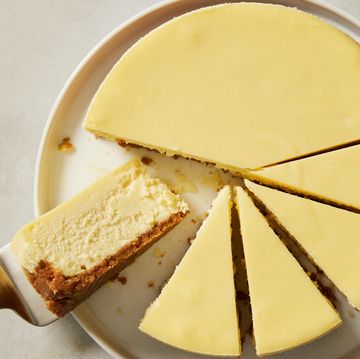 classic cheesecake with graham cracker crust, cut into slices