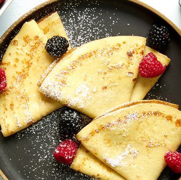 crepes with raspberries, blackberries, and dusted with powdered sugar