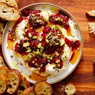 whipped garlic and herb feta, topped with fresh cranberry sauce, pistachios, and honey