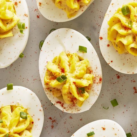 Deviled Eggs deviled eggs with paprika and sliced chives