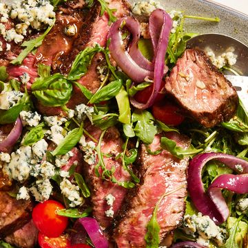 grilled steak salad with avocado, blue cheese, cherry tomatoes and red onions