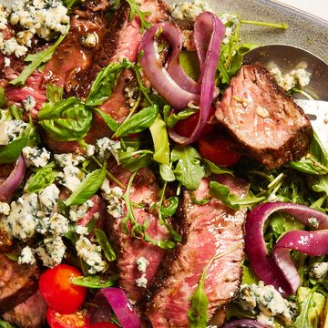 grilled steak salad with avocado, blue cheese, cherry tomatoes and red onions