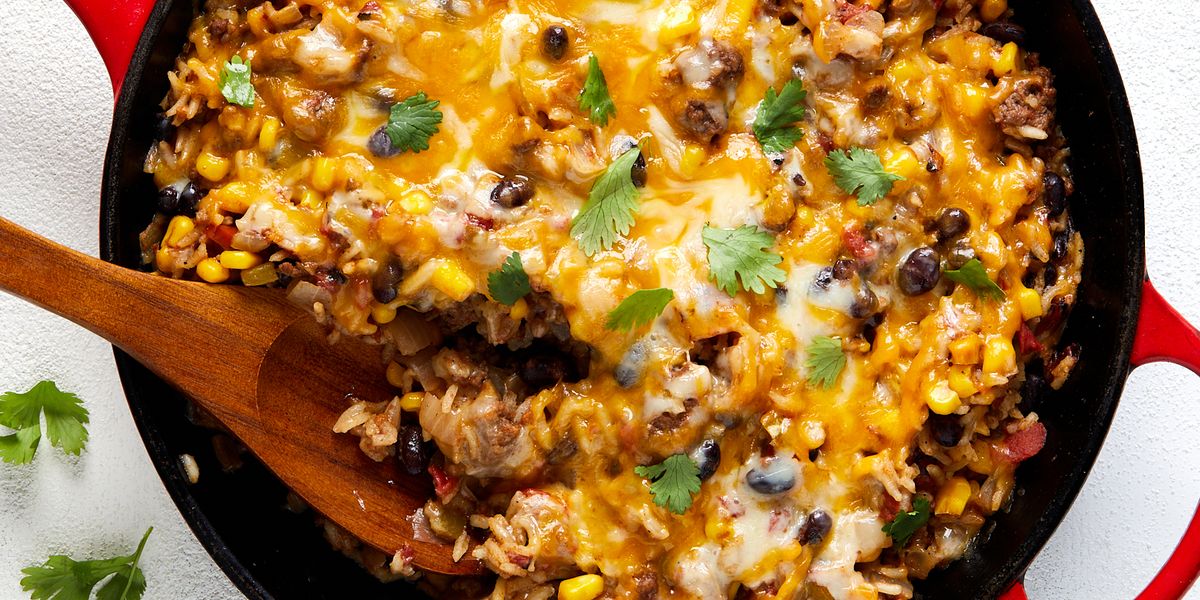 mexican beef 'n rice skillet topped with melty cheese and cilantro