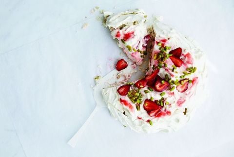 pavlova topped with rhubarb and pistachios pavlova topped with rhubarb and pistachios