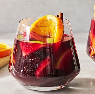 red sangria with fruit and cinnamon sticks