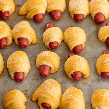 pigs in a blanket on a baking sheet