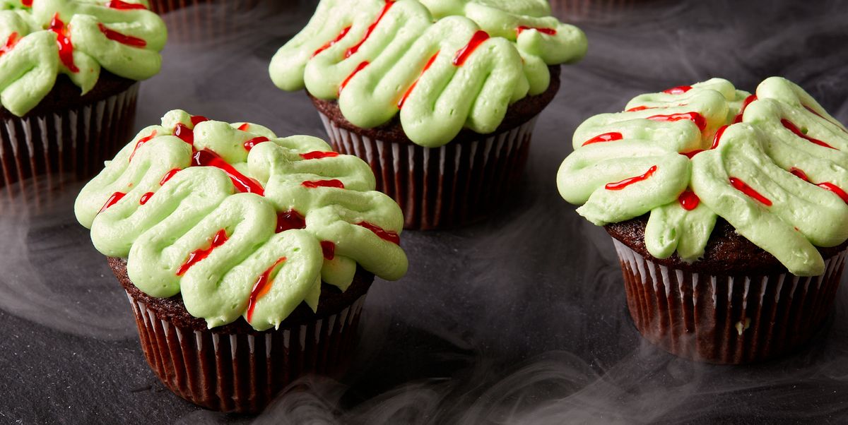 Zombie Brain Cupcakes chocolate cupcakes decorated with green frosting and red gel food coloring to look like zombie brains
